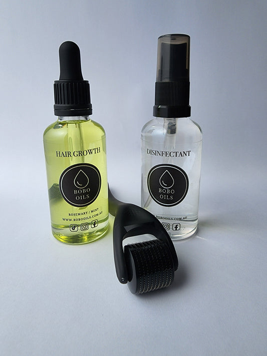 Unveiling the Dynamic Duo: Rosemary and Mint Hair Growth Oil and Derma Roller by BOBO OILS